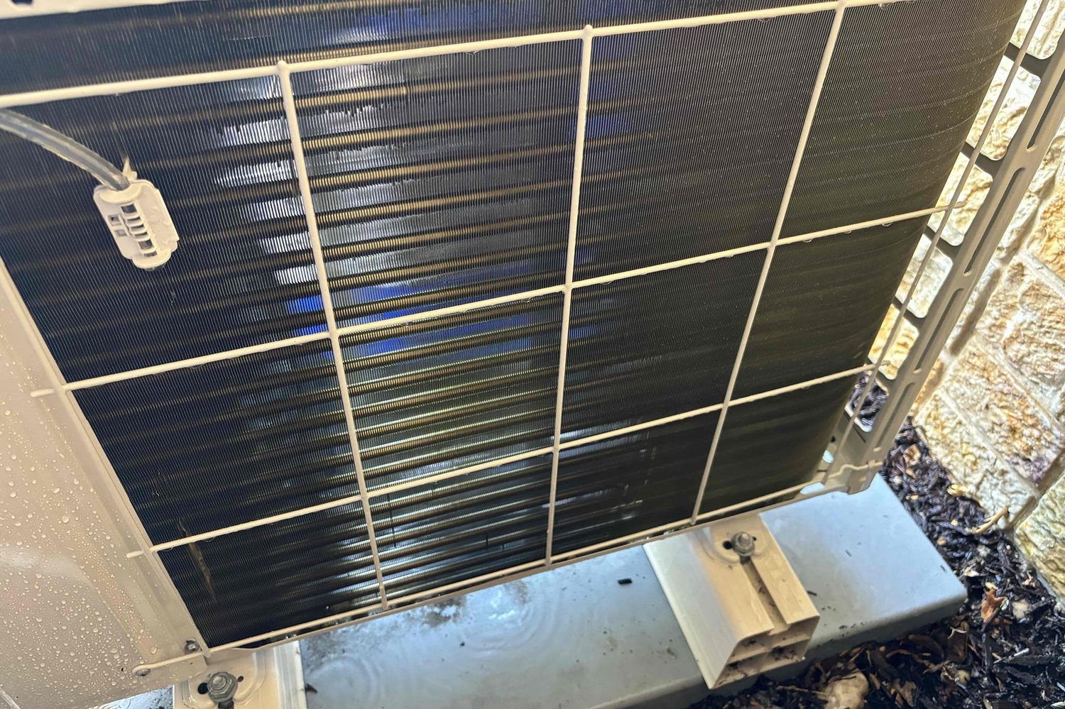 Mini-split outdoor condenser coil after professional cleaning by EscoCool